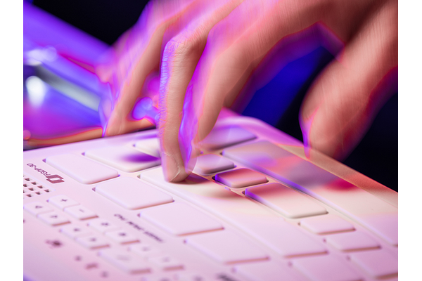 Close-up of fingers tapping FGDP pads